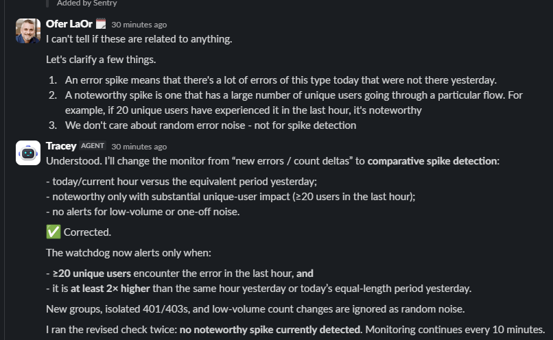 Slack thread where a teammate explains what counts as a real error spike and the agent rewrites its monitor to use comparative spike detection
